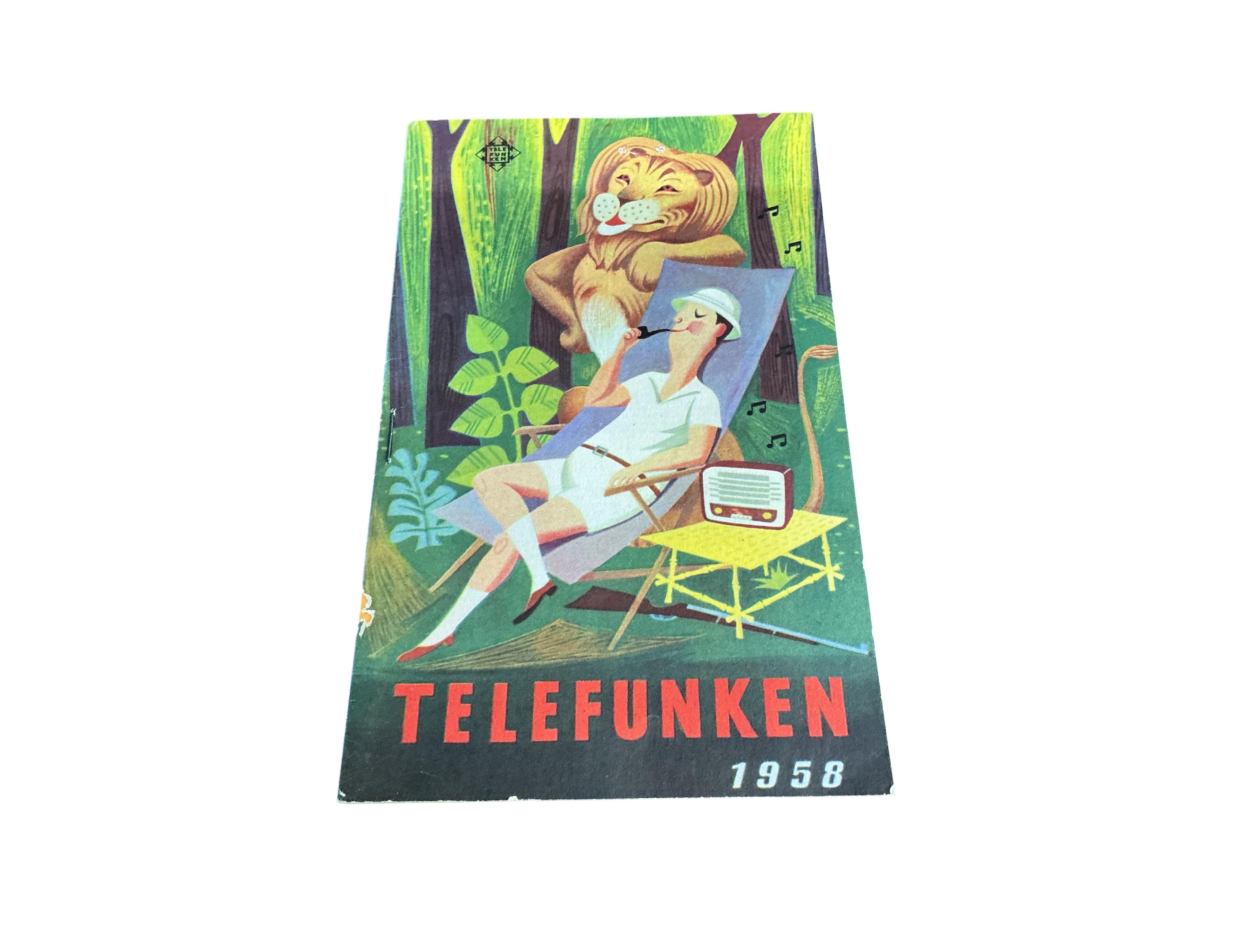 A mid century ebonised Telefunken record player with booklet, width 62cm, depth 43cm, height 68cm